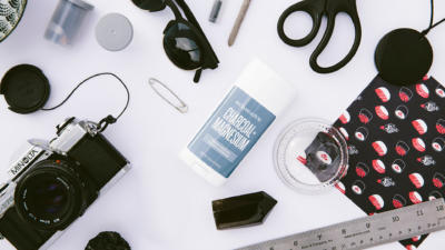 schmidt's charcoal magnesium deodorant with other black and grey objects